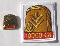 Picture of the pin and patch for 10,000 Kilometers