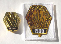 Picture of the pin and patch for 1,500 Events