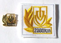 Picture of the pin and patch for 2,000 Kilometers