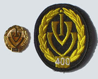 Picture of the pin and patch for 400 Events