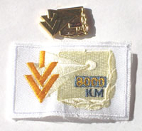 Picture of the pin and patch for 8,000 Kilometers